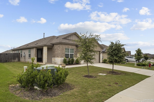 31665 Acacia Vis, Bulverde, TX 78163 - view of front of home featuring driveway, a garage, stone siding, and board and batten siding