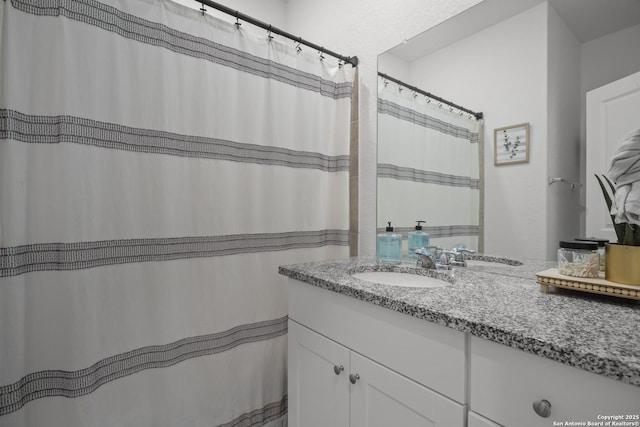 31665 Acacia Vis, Bulverde, TX 78163 - bathroom with vanity and curtained shower