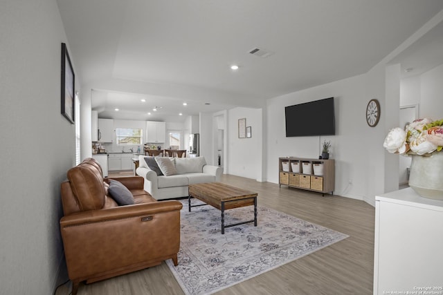 31665 Acacia Vis, Bulverde, TX 78163 - living room with light wood-style floors, recessed lighting, and baseboards