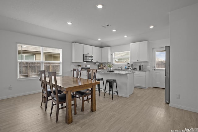 31665 Acacia Vis, Bulverde, TX 78163 - dining room featuring light wood-style floors, baseboards, and recessed lighting