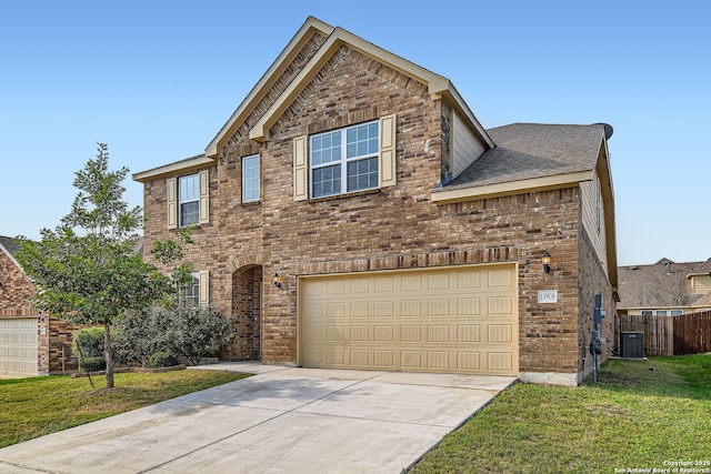 13908 Lazada, San Antonio, TX 78245 - traditional-style house with central AC, brick siding, driveway, and a garage