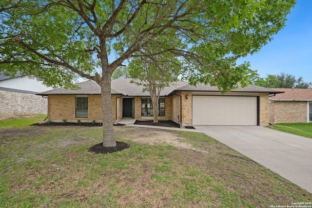 7527 Rustic Trl, San Antonio, TX 78244 - view of front of house with a garage, driveway, brick siding, and roof with shingles