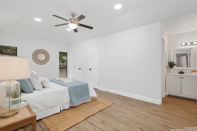 7527 Rustic Trl, San Antonio, TX 78244 - bedroom featuring light wood-style floors, baseboards, recessed lighting, connected bathroom, and ceiling fan