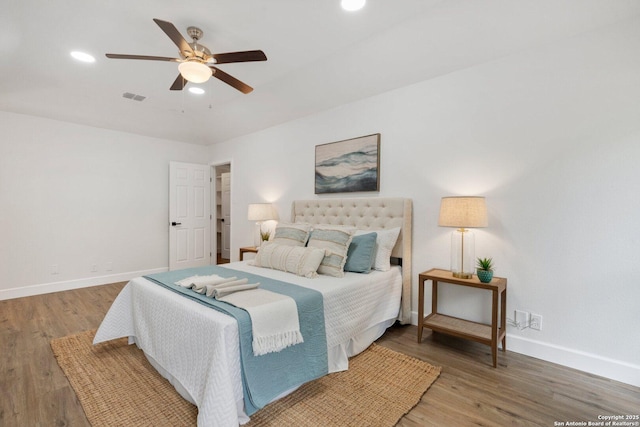 7527 Rustic Trl, San Antonio, TX 78244 - bedroom with baseboards, wood finished floors, recessed lighting, and ceiling fan