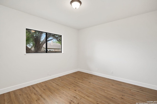 7527 Rustic Trl, San Antonio, TX 78244 - empty room featuring baseboards and light wood finished floors