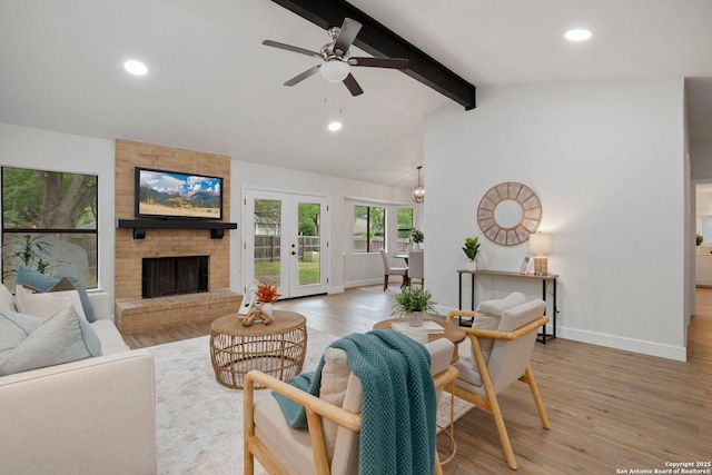 7527 Rustic Trl, San Antonio, TX 78244 - living area with ceiling fan, light wood-type flooring, baseboards, a fireplace, and recessed lighting