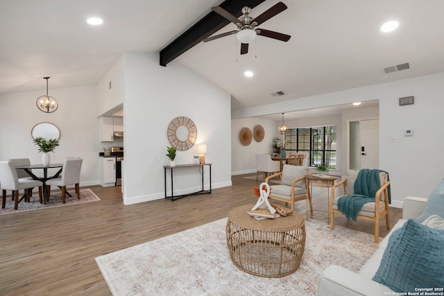 7527 Rustic Trl, San Antonio, TX 78244 - living area featuring ceiling fan, light wood-style flooring, recessed lighting, baseboards, and a chandelier
