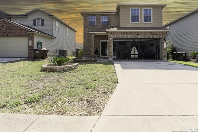3322 Dunlap Flds, Converse, TX 78109 - traditional-style home featuring brick siding, driveway, a garage, and a front yard