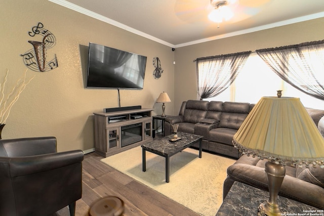 3322 Dunlap Flds, Converse, TX 78109 - living room featuring wood finished floors, crown molding, baseboards, and ceiling fan