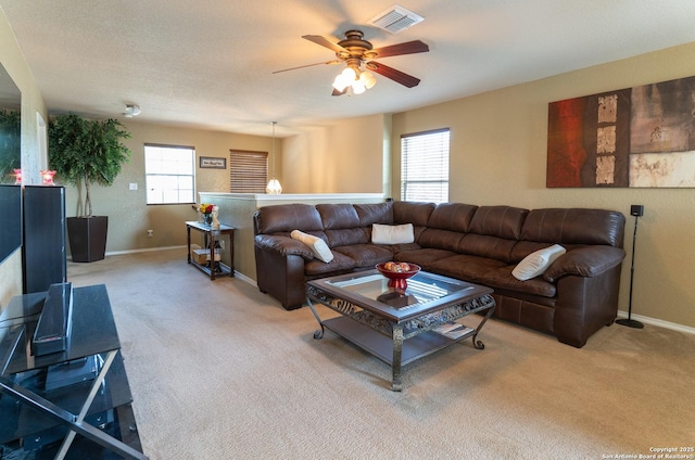 3322 Dunlap Flds, Converse, TX 78109 - living area featuring carpet, a ceiling fan, and baseboards