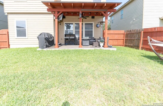 3322 Dunlap Flds, Converse, TX 78109 - back of property with a ceiling fan, a patio, and an outdoor hangout area