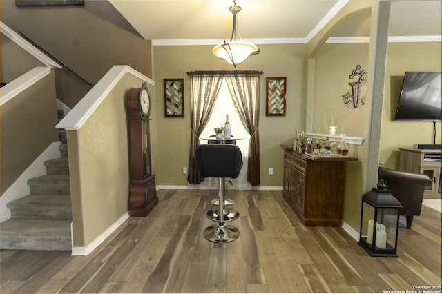 3322 Dunlap Flds, Converse, TX 78109 - dining area featuring wood finished floors, stairway, ornamental molding, and baseboards