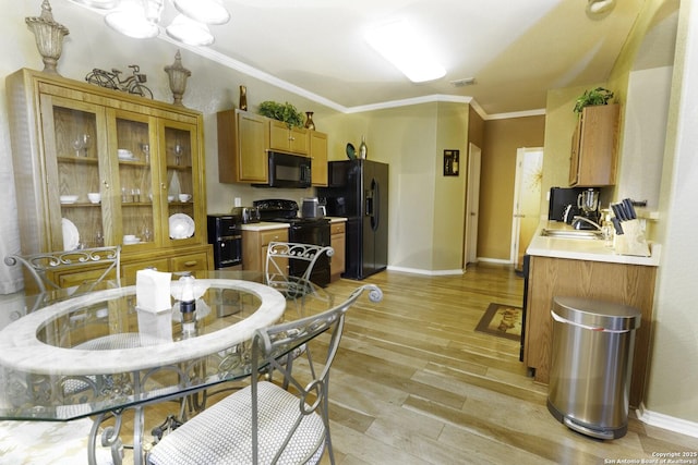 3322 Dunlap Flds, Converse, TX 78109 - dining room featuring ornamental molding, baseboards, and light wood-style flooring