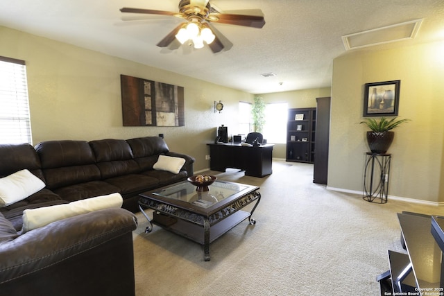 3322 Dunlap Flds, Converse, TX 78109 - living area with light colored carpet, ceiling fan, baseboards, and an office area
