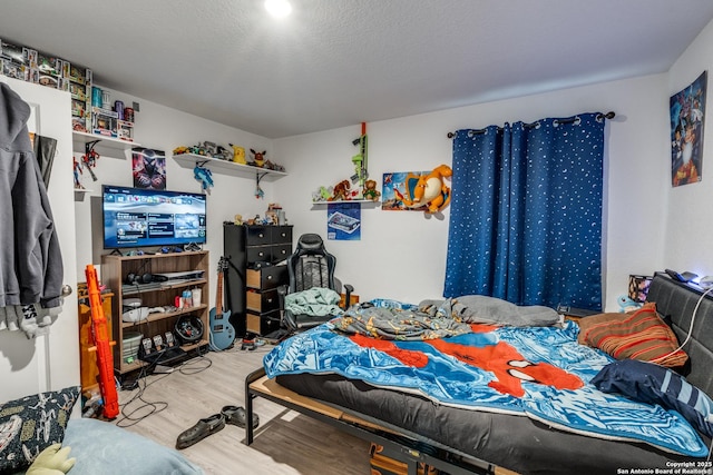 10827 Hernando Ct, Converse, TX 78109 - bedroom featuring wood finished floors