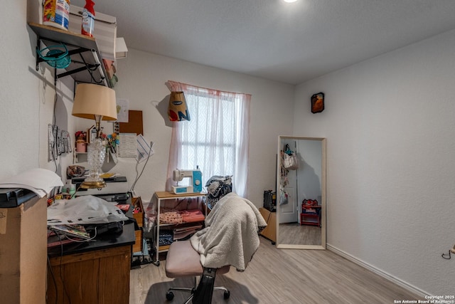 10827 Hernando Ct, Converse, TX 78109 - office with light wood-style flooring and baseboards