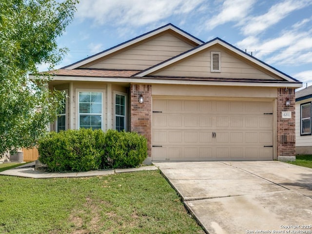 6211 Post Mi, San Antonio, TX 78244 - ranch-style house with brick siding, concrete driveway, a garage, and a front yard
