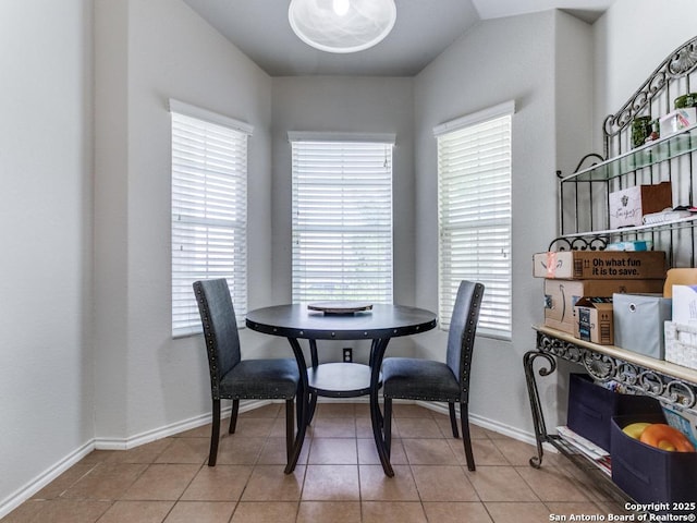 6211 Post Mi, San Antonio, TX 78244 - tiled dining space featuring baseboards