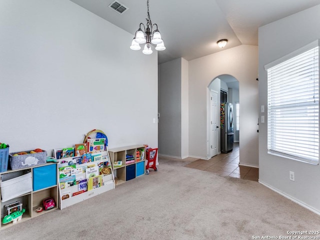 6211 Post Mi, San Antonio, TX 78244 - playroom featuring arched walkways, carpet, a chandelier, lofted ceiling, and baseboards