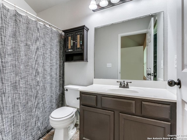 6211 Post Mi, San Antonio, TX 78244 - bathroom featuring toilet, vanity, and a shower with curtain