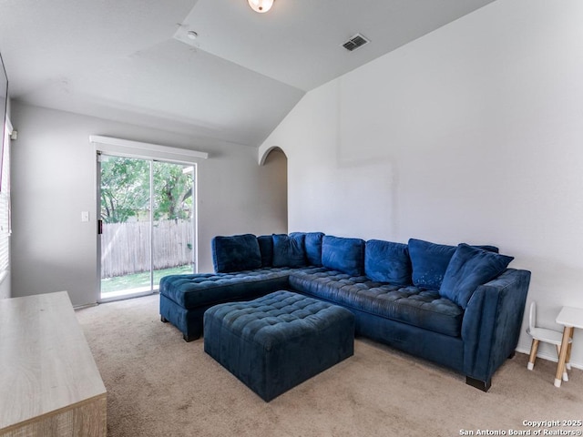 6211 Post Mi, San Antonio, TX 78244 - living area featuring light carpet, vaulted ceiling, and arched walkways