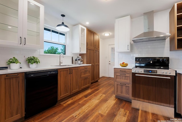 515 Westfall Ave, San Antonio, TX 78210 - kitchen featuring black dishwasher, range with electric stovetop, a sink, wall chimney exhaust hood, and light countertops