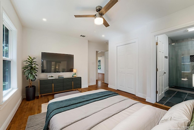 515 Westfall Ave, San Antonio, TX 78210 - bedroom featuring wood finished floors, a closet, baseboards, a ceiling fan, and recessed lighting