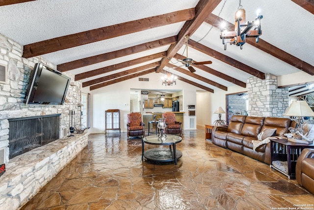 10745 Rosemar Ln, Adkins, TX 78101 - living room featuring a chandelier, a fireplace, stone floors, a ceiling fan, and a textured ceiling