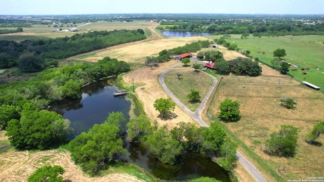 10745 Rosemar Ln, Adkins, TX 78101 - aerial overview of property's location with rural landscape and a nearby body of water
