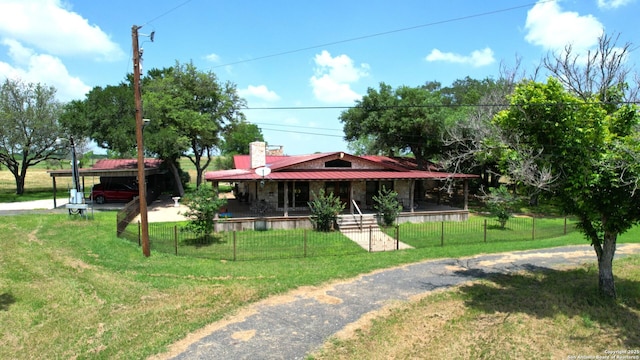 10745 Rosemar Ln, Adkins, TX 78101 - view of front of house with covered porch and metal roof
