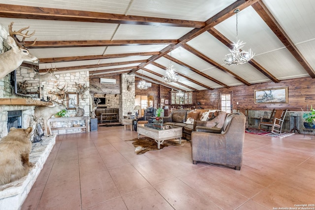 10745 Rosemar Ln, Adkins, TX 78101 - living room featuring a fireplace, a chandelier, wood walls, a wall mounted air conditioner, and tile patterned floors