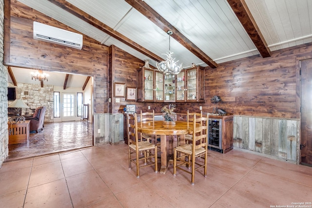 10745 Rosemar Ln, Adkins, TX 78101 - dining room featuring a chandelier, an AC wall unit, wood walls, light tile patterned flooring, and wine cooler