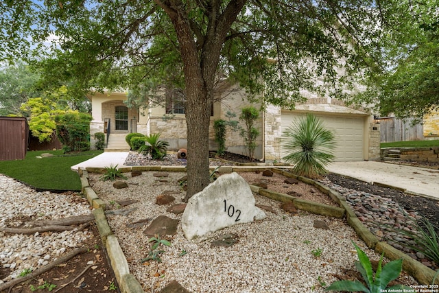 102 Blue Thorn, San Antonio, TX 78256 - view of yard with driveway and an attached garage