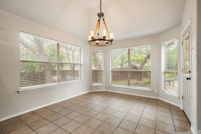 102 Blue Thorn, San Antonio, TX 78256 - unfurnished dining area with lofted ceiling, light tile patterned floors, a chandelier, and baseboards