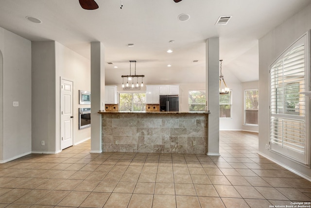 102 Blue Thorn, San Antonio, TX 78256 - kitchen with stainless steel appliances, white cabinets, light tile patterned floors, ceiling fan, and recessed lighting