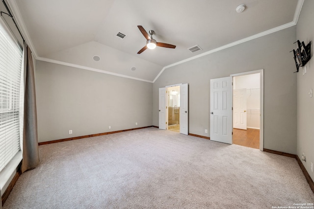 102 Blue Thorn, San Antonio, TX 78256 - unfurnished bedroom featuring carpet, lofted ceiling, baseboards, ornamental molding, and a walk in closet