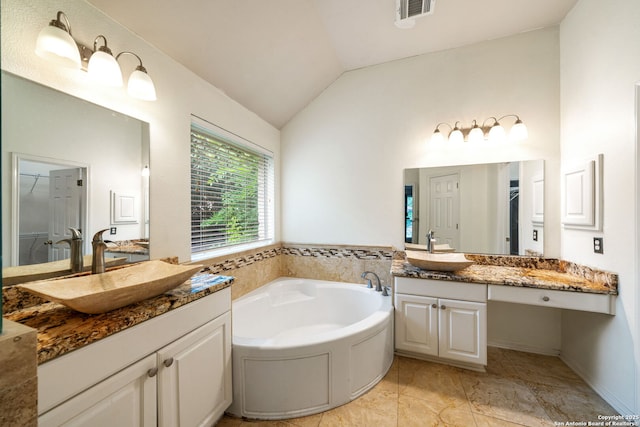 102 Blue Thorn, San Antonio, TX 78256 - bathroom featuring two vanities, a bath, and lofted ceiling