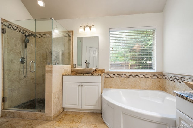 102 Blue Thorn, San Antonio, TX 78256 - bathroom featuring vanity, plenty of natural light, a garden tub, a shower stall, and recessed lighting