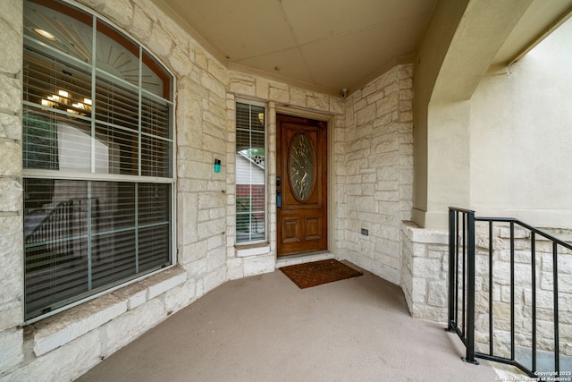 102 Blue Thorn, San Antonio, TX 78256 - entrance to property featuring stone siding and a porch