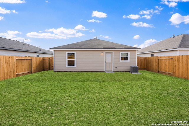 12055 Luckey Villa, San Antonio, TX 78252 - back of house featuring central air condition unit and a shingled roof