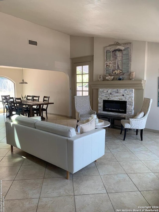 12111 Woodsrim, Live Oak, TX 78233 - living room with light tile patterned flooring, a fireplace, and high vaulted ceiling