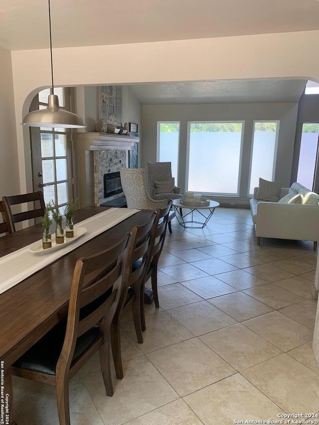 12111 Woodsrim, Live Oak, TX 78233 - dining area featuring a tiled fireplace and light tile patterned floors
