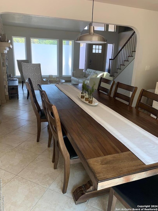 12111 Woodsrim, Live Oak, TX 78233 - dining space featuring light tile patterned floors and stairs