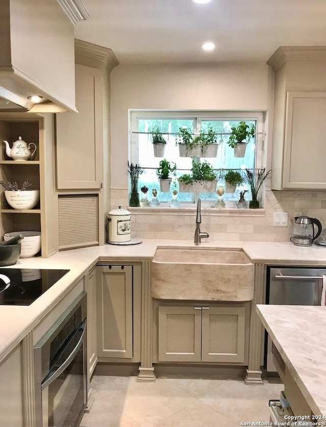 12111 Woodsrim, Live Oak, TX 78233 - kitchen featuring appliances with stainless steel finishes, a sink, light countertops, tasteful backsplash, and recessed lighting