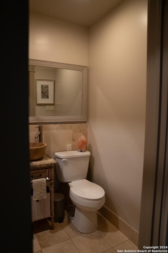 12111 Woodsrim, Live Oak, TX 78233 - half bathroom featuring toilet, tile patterned flooring, and vanity