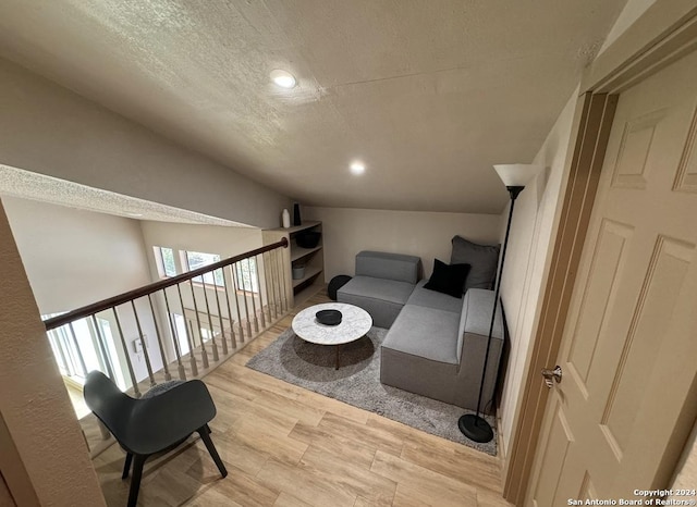 12111 Woodsrim, Live Oak, TX 78233 - sitting room featuring wood finished floors, a textured ceiling, and recessed lighting