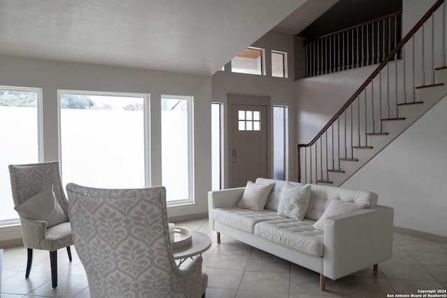 12111 Woodsrim, Live Oak, TX 78233 - living room with plenty of natural light, stairway, and light tile patterned floors