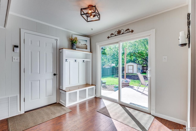 3618 Minthill, San Antonio, TX 78230 - mudroom with crown molding, wood finished floors, and baseboards
