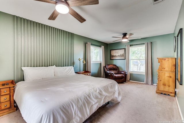 3618 Minthill, San Antonio, TX 78230 - carpeted bedroom with multiple windows, ceiling fan, and baseboards