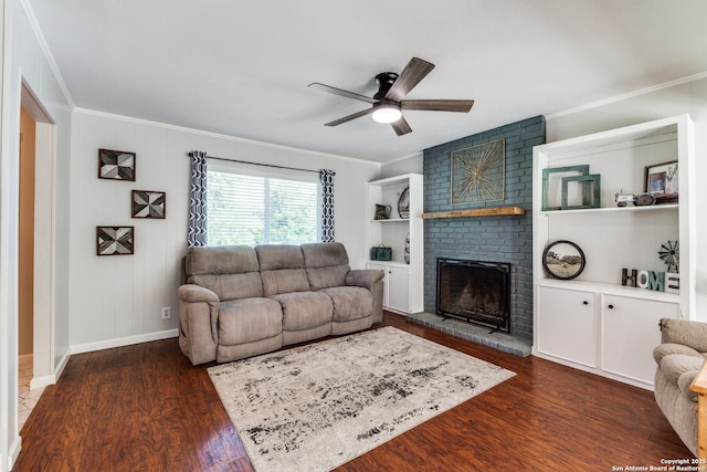 3618 Minthill, San Antonio, TX 78230 - living room featuring crown molding, a ceiling fan, a brick fireplace, wood finished floors, and baseboards